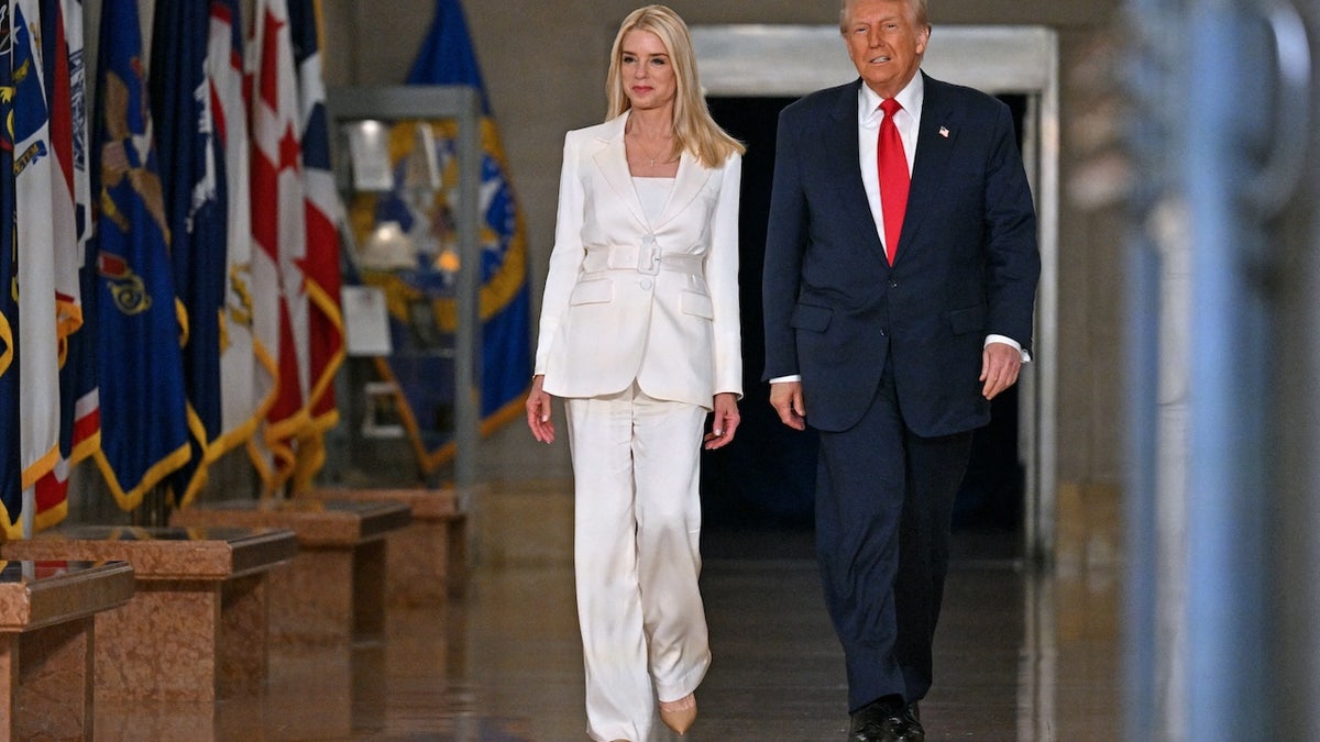 United States President Donald Trump and United States Attorney General Pam Bondi (L) are talking to Washington's Department of Justice DC (Roberto Schmidt/AFP through Getty)