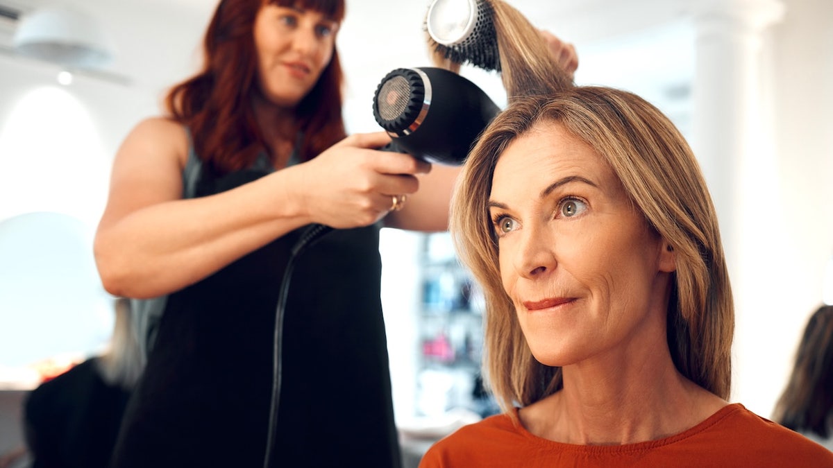 Woman at hairdressing
